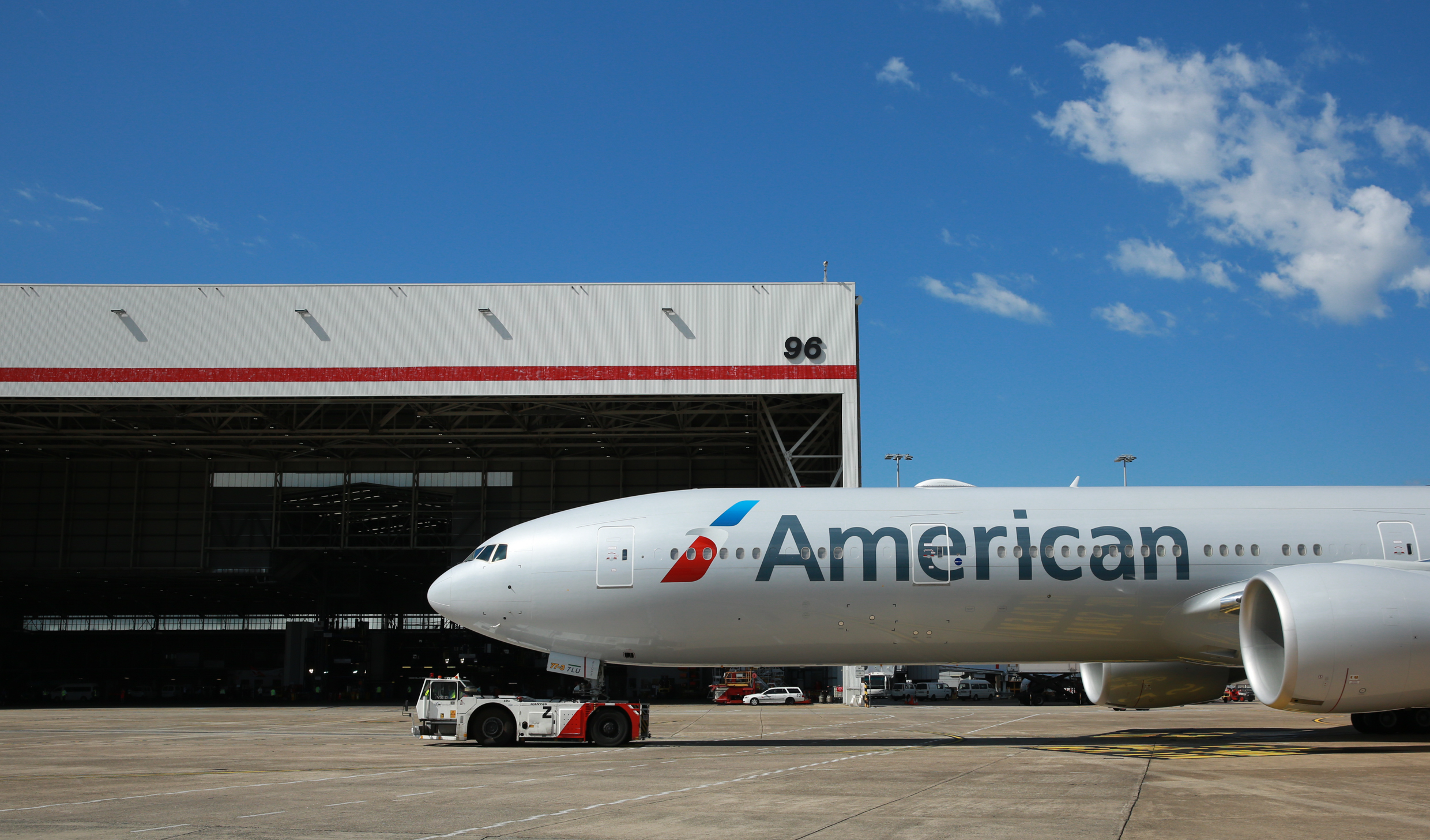 American airlines 777300er flies over Sydney Harbour ahead of