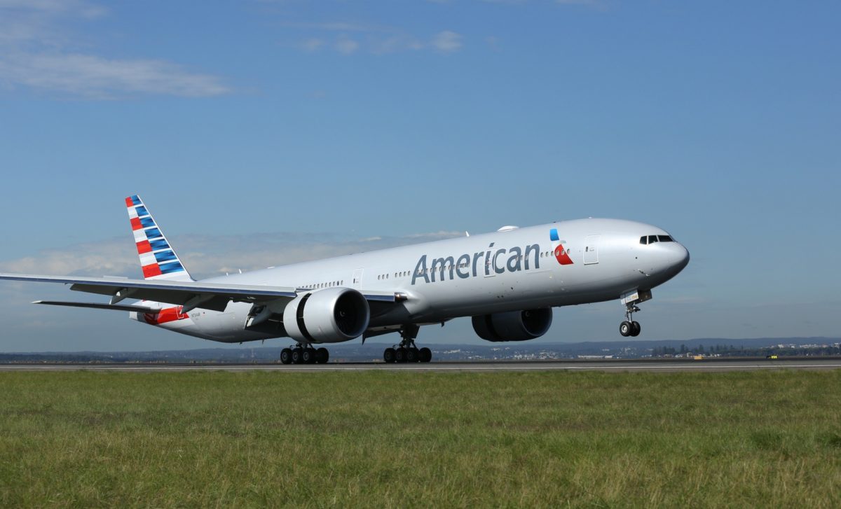 American airlines 777-300er flies over Sydney Harbour